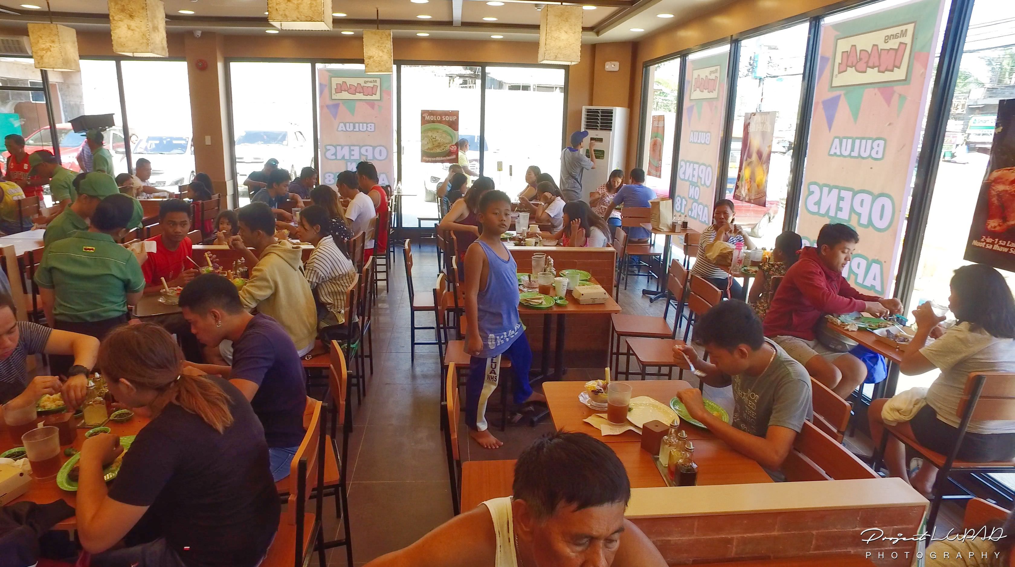 Guests inside Mang Inasal Bulua on opening day