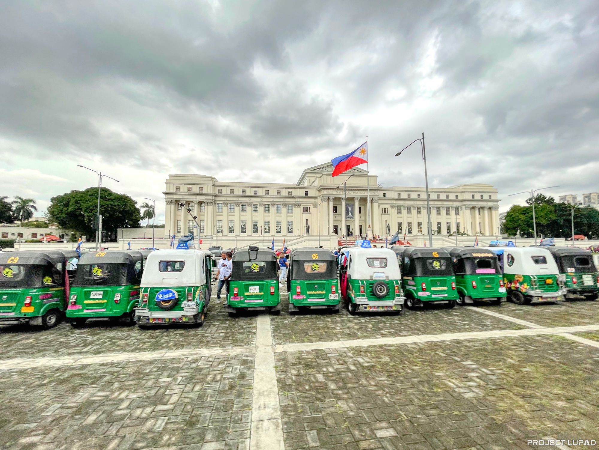 Bajaj three-wheelers lined up in Manila, shot for this Bajaj case study by Project LUPAD