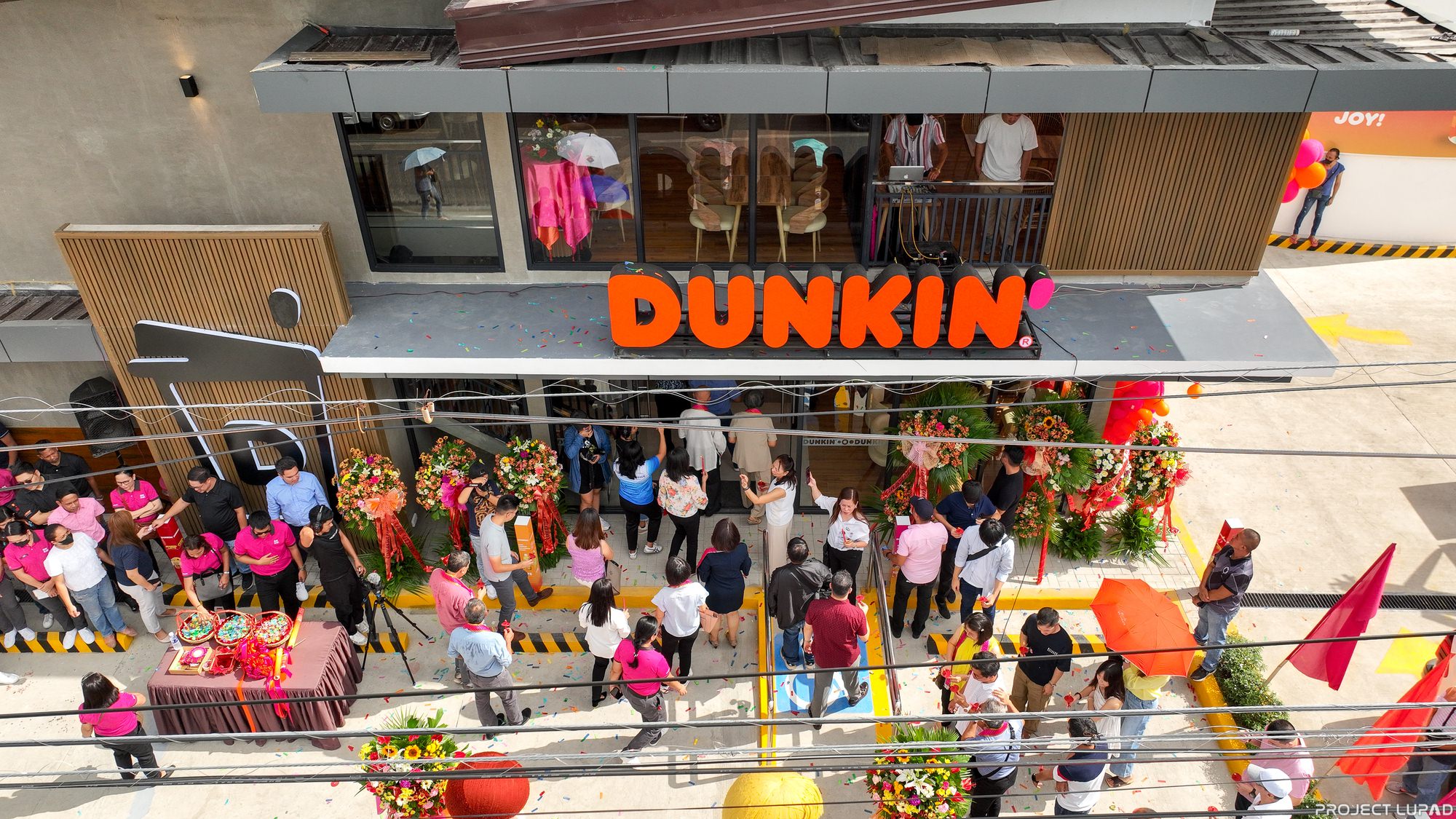Crowd at the Dunkin’ Drive-Thru opening in Iligan, shot for this Dunkin’ case study by Project LUPAD
