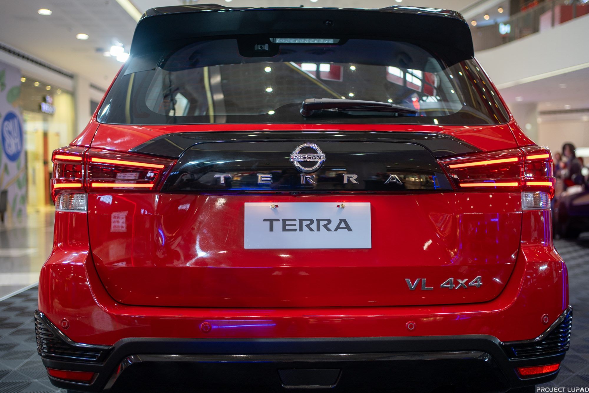 A red Nissan at the Nissan Intelligent Mobility Tour