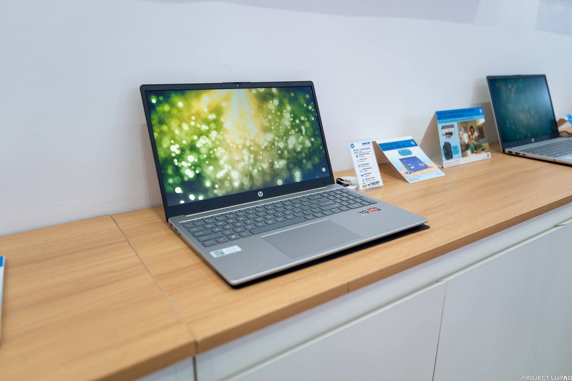 An HP laptop on display at the concept store