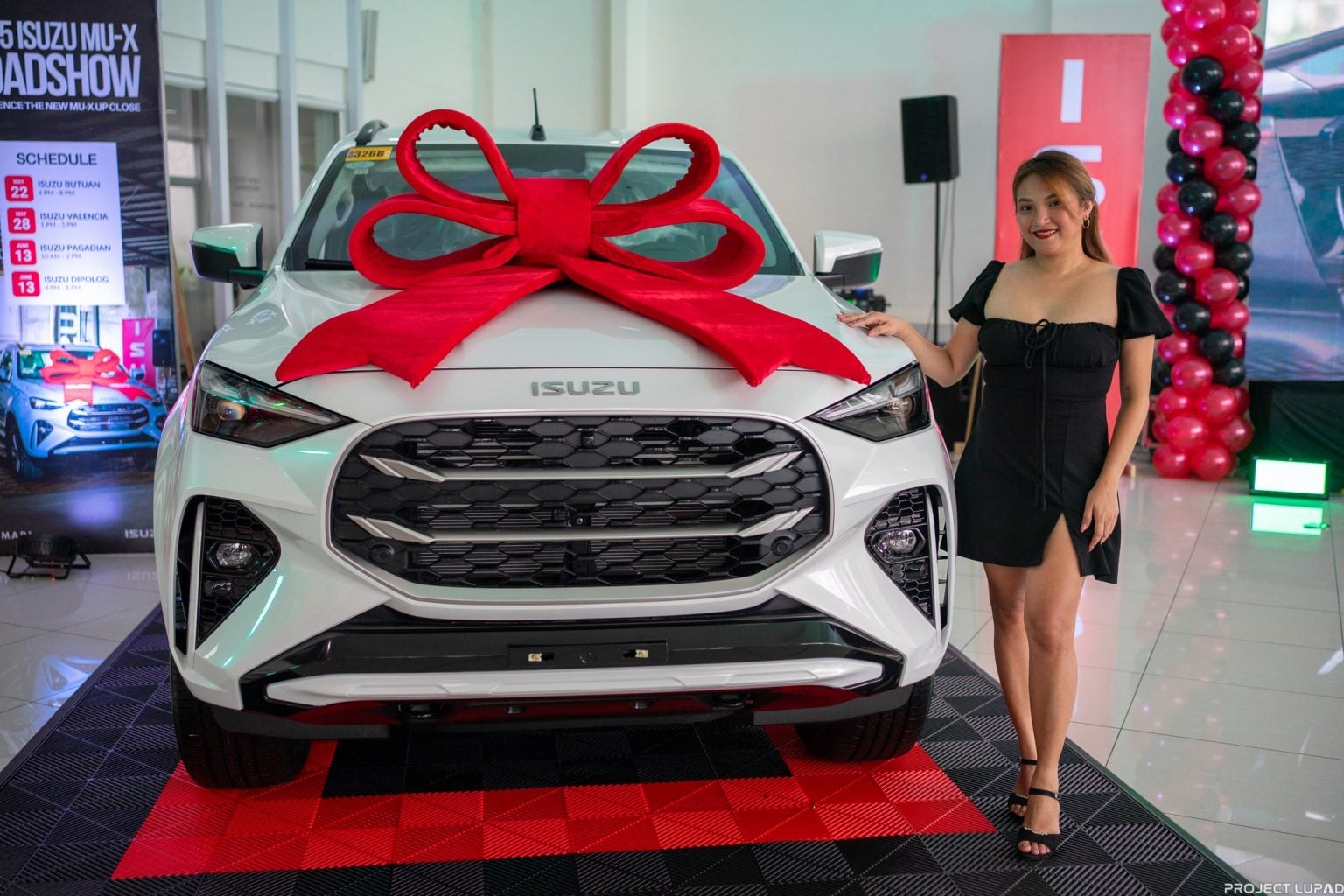 The 2025 Isuzu mu-X under wraps at the Butuan reveal