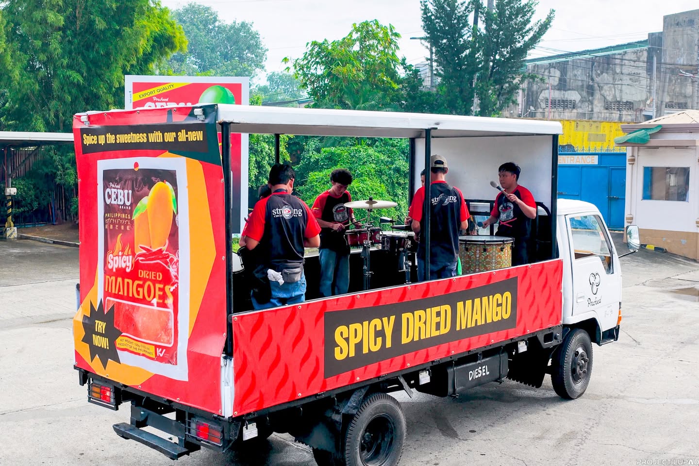 The Cebu Brand Spicy Dried Mango truck and its crew
