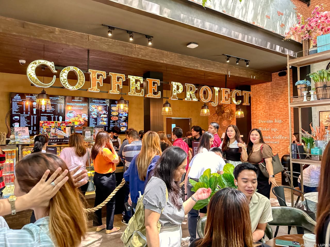 Guests outside Coffee Project Gran Europa in Uptown CDO, shot for this Coffee Project case study by Project LUPAD