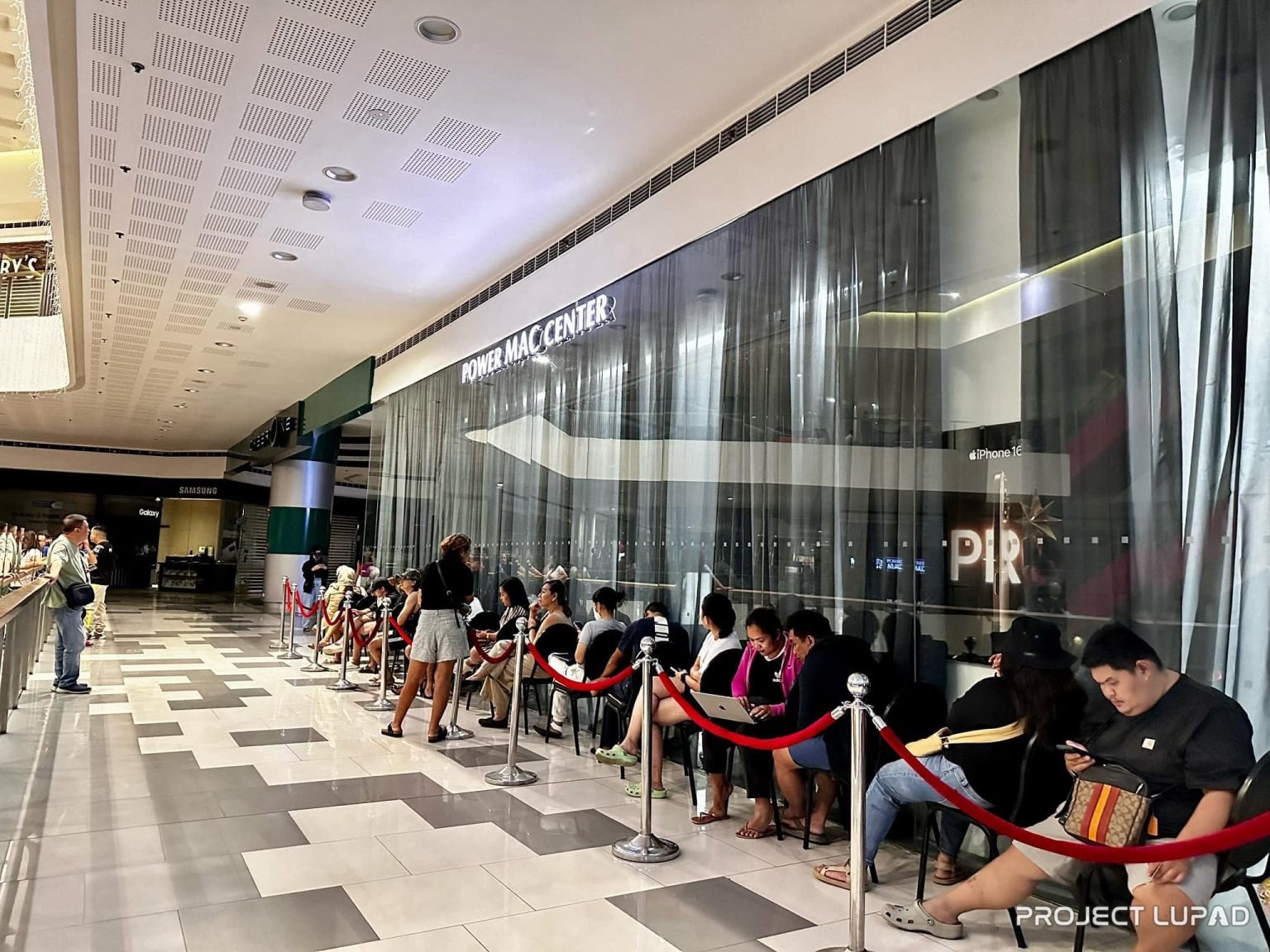 The queue outside Power Mac Center before midnight