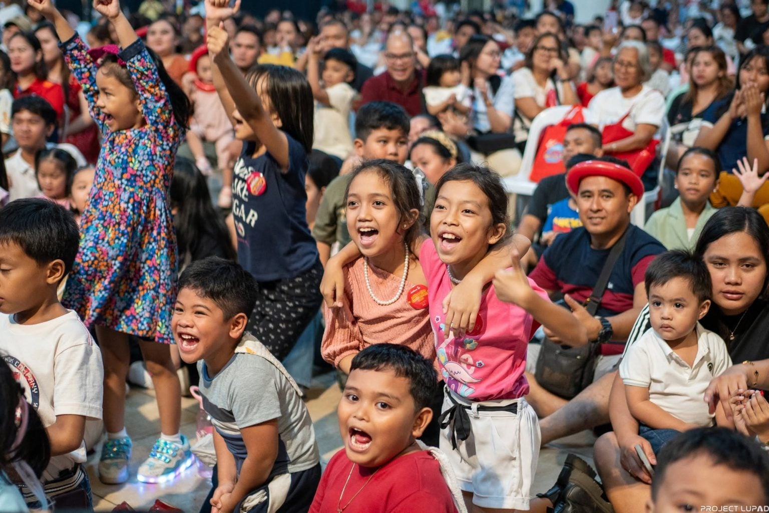 Kids cheering for Jollibee at the Jollibee Kids Convention in Cagayan de Oro
